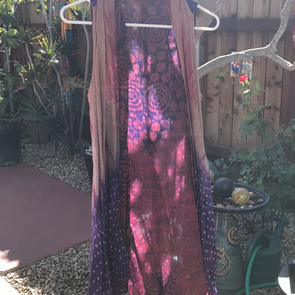 Sleeveless wrap duster